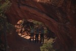 Tourists in Double O Arch